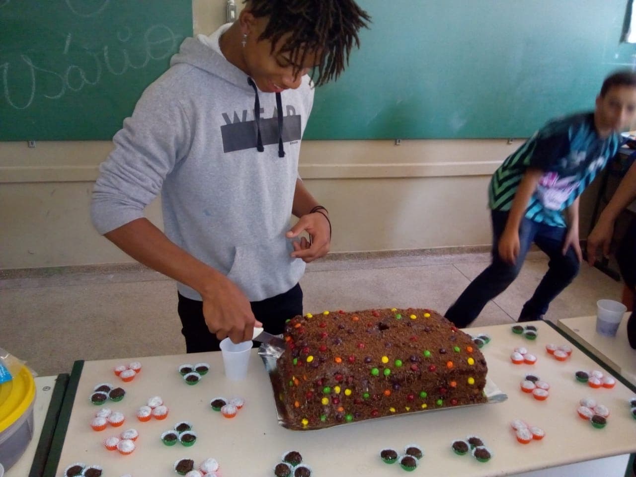 Cutting the cake for friends